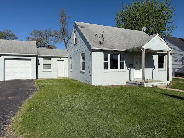 5727 Merriman Rd, Garden City, MI 48135 - view of front of house with a shingled roof, a garage, a front lawn, and asphalt driveway