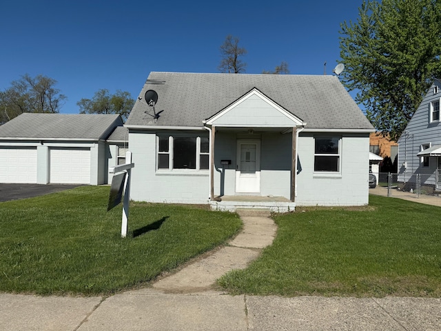 5727 Merriman Rd, Garden City, MI 48135 - view of front facade featuring concrete block siding, a garage, driveway, and roof with shingles