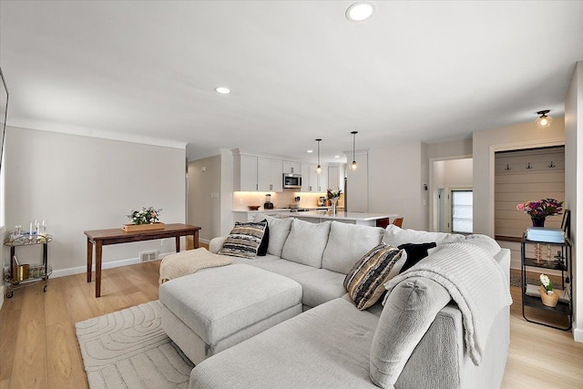 living room featuring light hardwood / wood-style floors