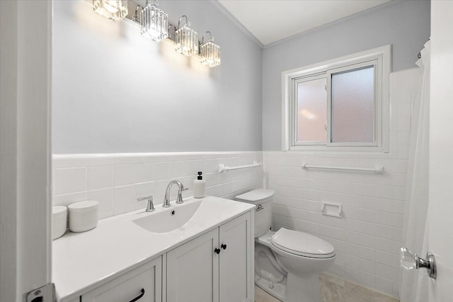 bathroom featuring tile walls, toilet, and vanity