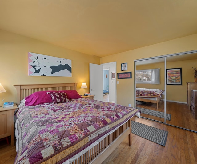 bedroom featuring light hardwood / wood-style floors