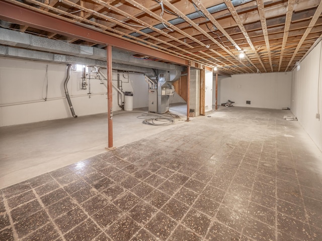 basement featuring heating unit