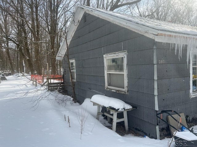 view of snow covered property