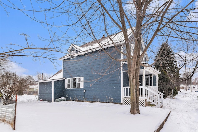 view of snow covered property