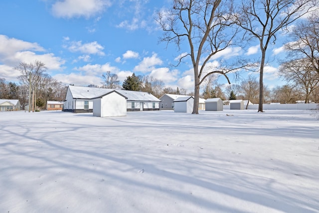 view of yard covered in snow