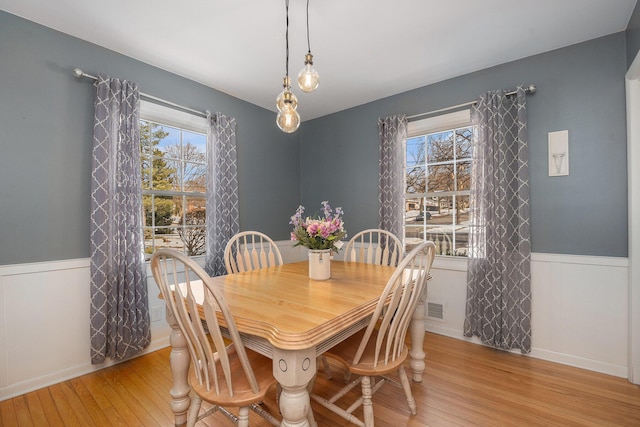 dining room featuring light hardwood / wood-style flooring