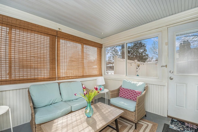 sunroom / solarium featuring a healthy amount of sunlight