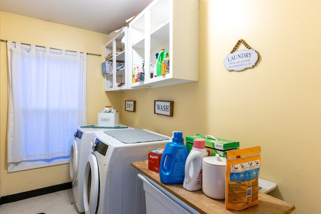 clothes washing area featuring independent washer and dryer