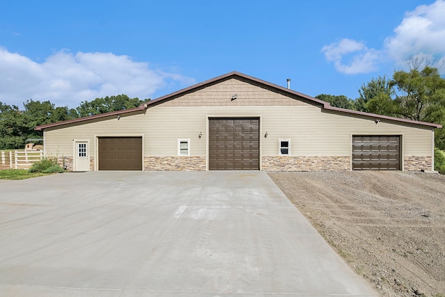 garage featuring fence