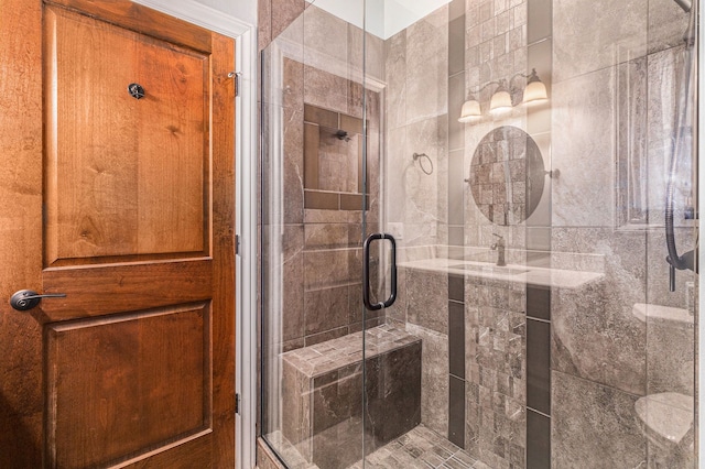 bathroom featuring a stall shower