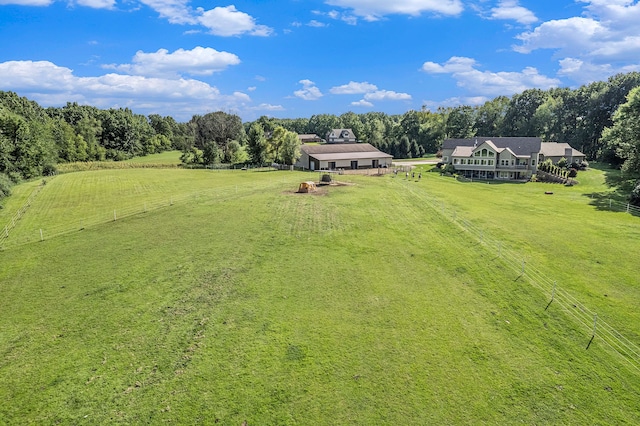 birds eye view of property featuring a rural view