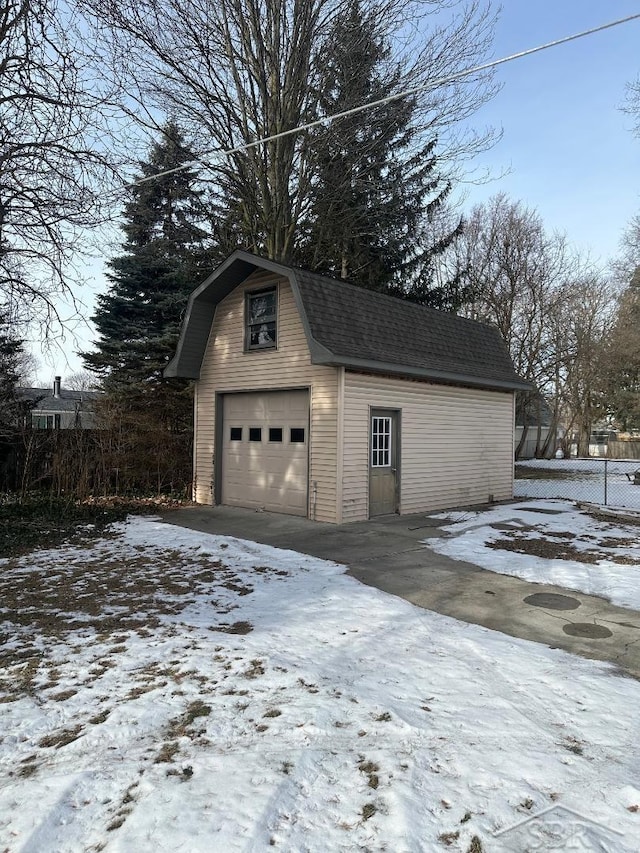 view of snow covered garage