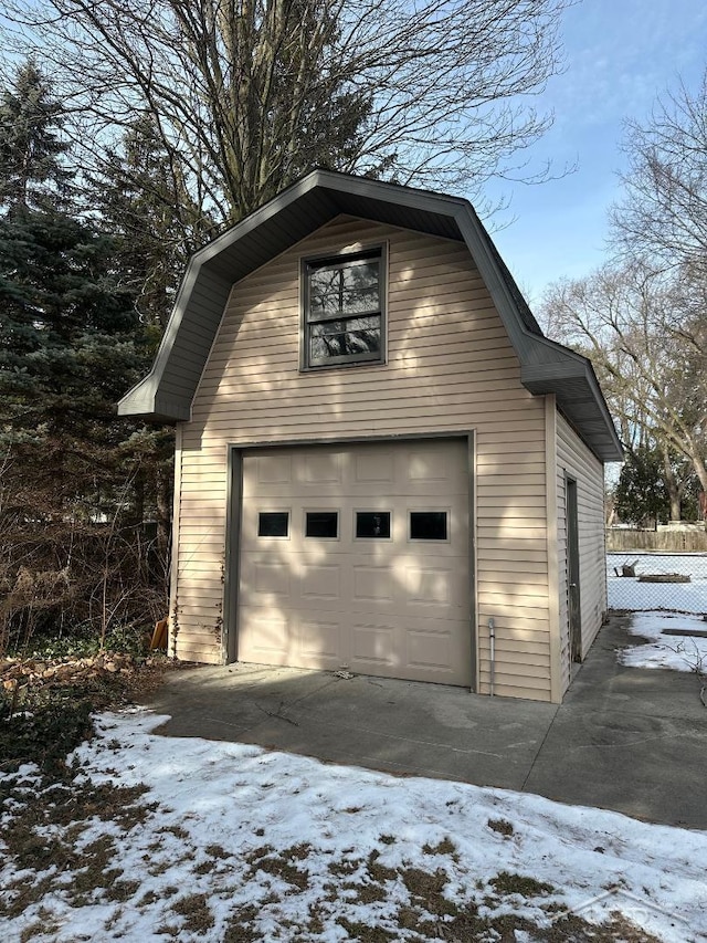 view of snow covered garage