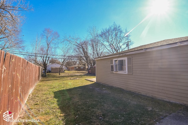 view of yard with fence