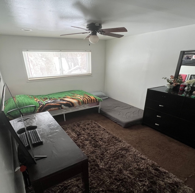 bedroom featuring carpet floors and ceiling fan