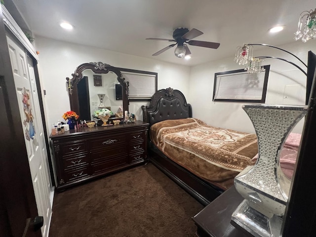 bedroom featuring dark colored carpet, a ceiling fan, and recessed lighting