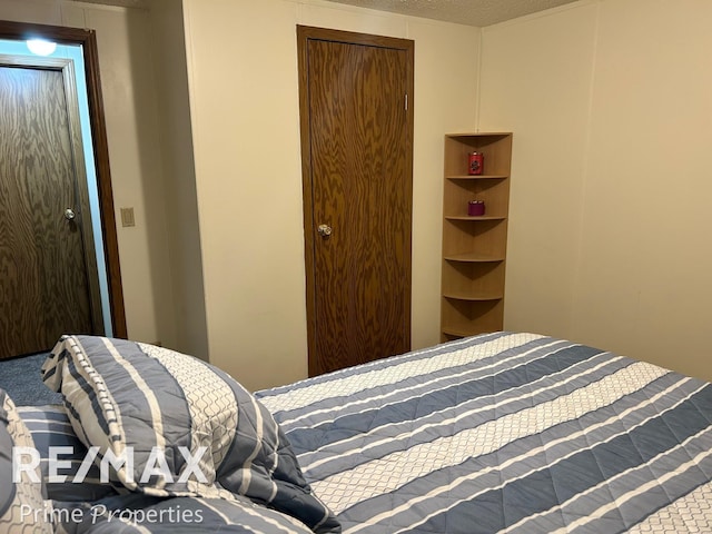 bedroom with a textured ceiling