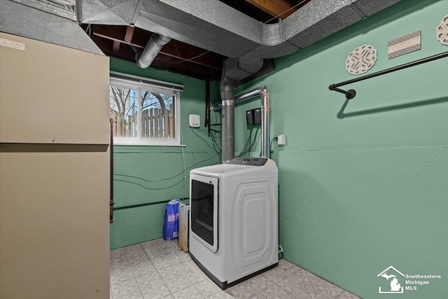 laundry room featuring washer / dryer