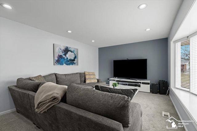 living room featuring light colored carpet