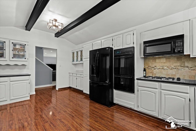 kitchen featuring white cabinets, dark hardwood / wood-style floors, lofted ceiling with beams, and black appliances