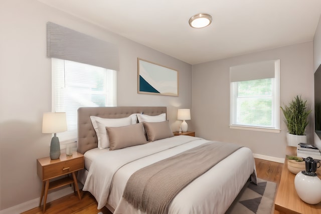 bedroom featuring hardwood / wood-style floors