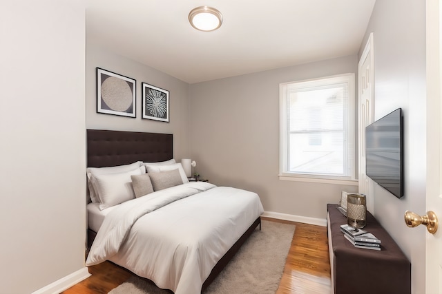 bedroom featuring light hardwood / wood-style floors