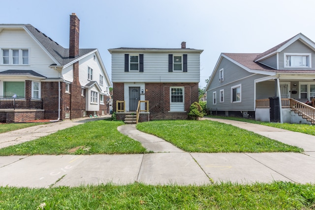 view of front facade featuring a front yard