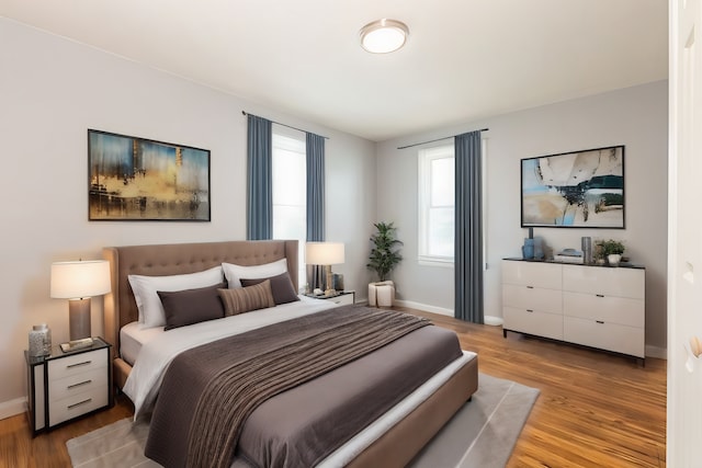 bedroom featuring hardwood / wood-style floors