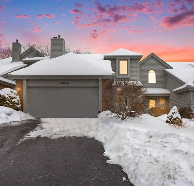 view of front of home with a garage