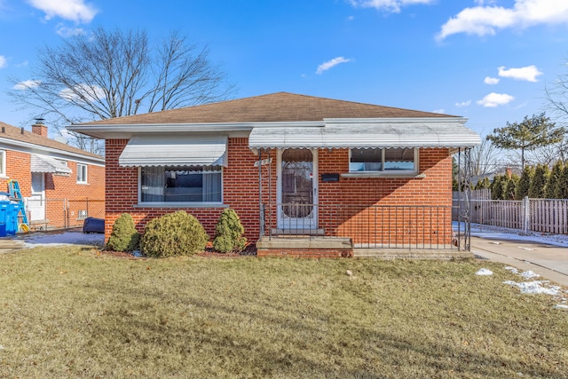 view of front of home with a front yard