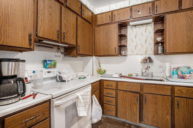 kitchen with open shelves, a sink, light countertops, and white electric range