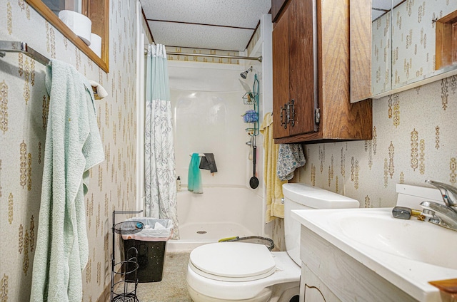 bathroom featuring toilet, wallpapered walls, vanity, and a stall shower