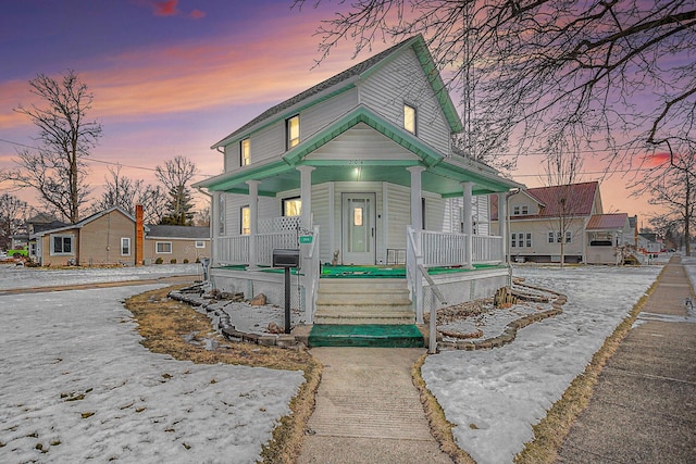 view of front of home featuring covered porch