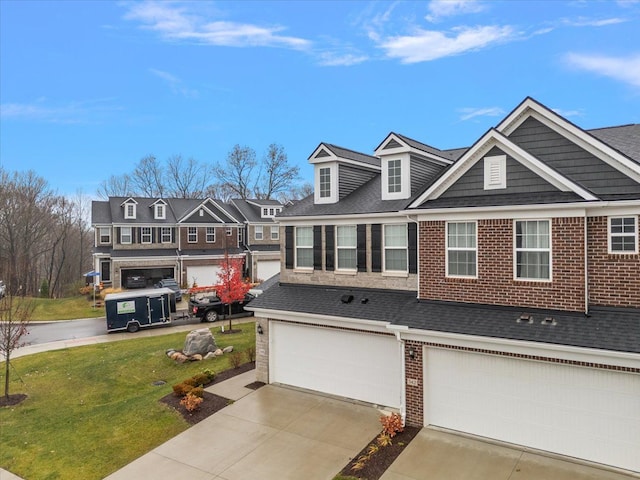 view of front facade featuring a garage and a front lawn