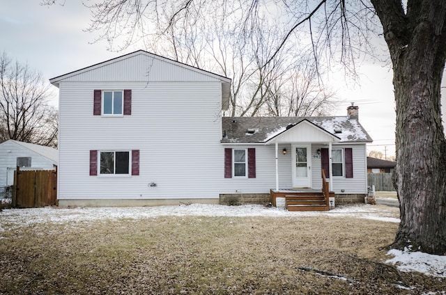 view of front of property with a lawn