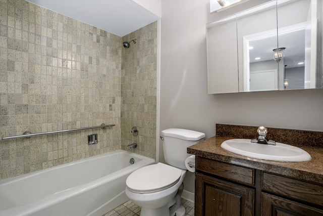 full bathroom with vanity, toilet, and tiled shower / bath combo