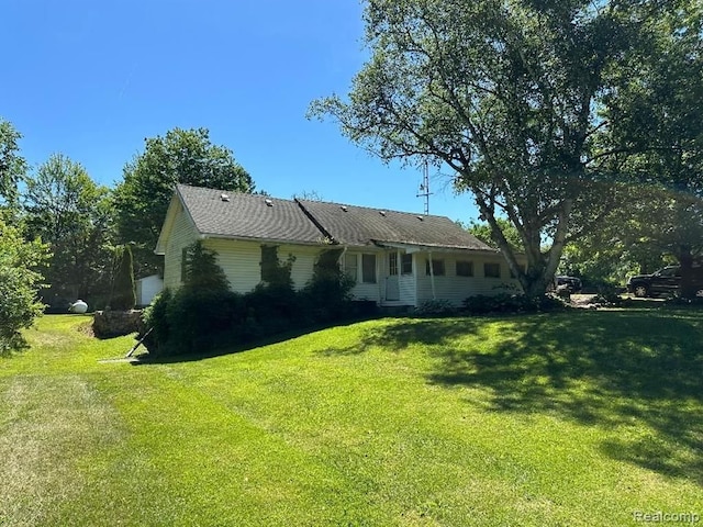 exterior space featuring a yard