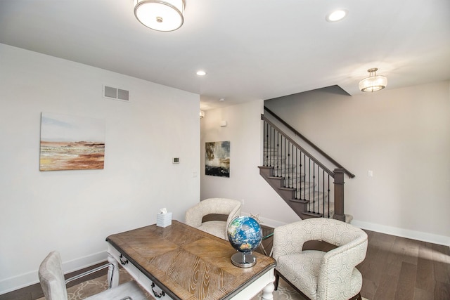 dining area with dark wood-type flooring