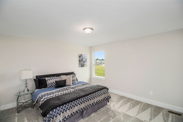 bedroom featuring carpet