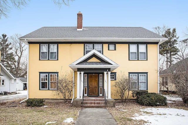 view of front of house featuring central AC unit