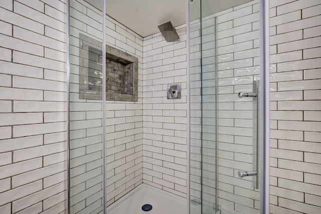 full bath featuring a stall shower