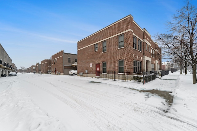 view of snow covered property