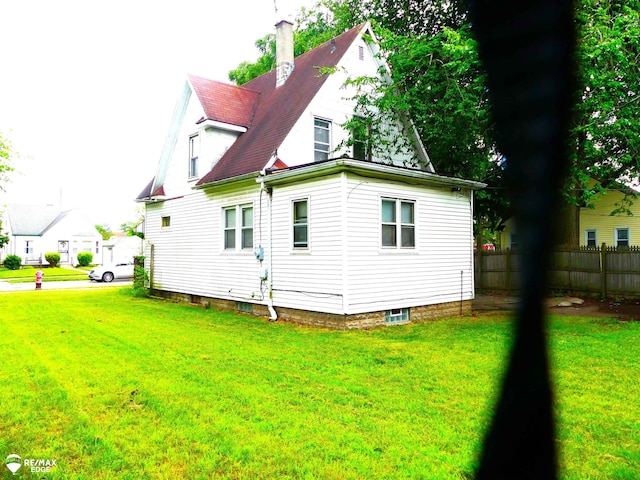 exterior space featuring a yard