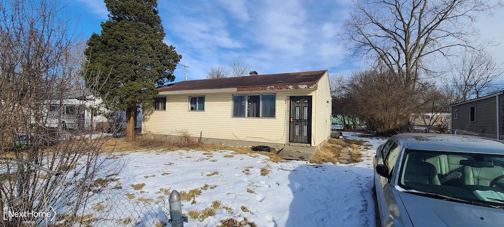 view of snow covered property