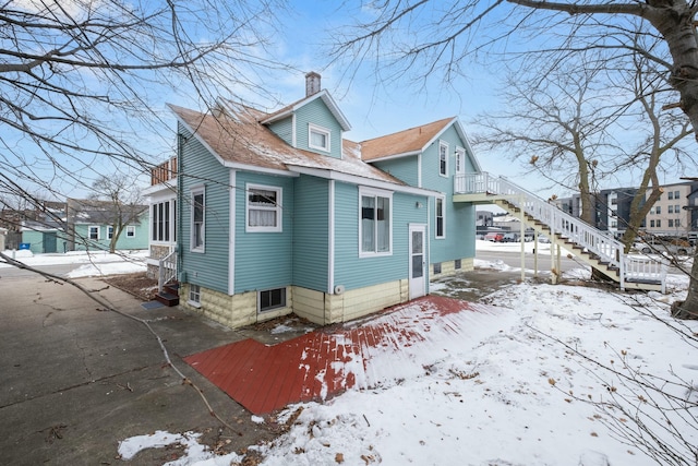 view of snow covered property