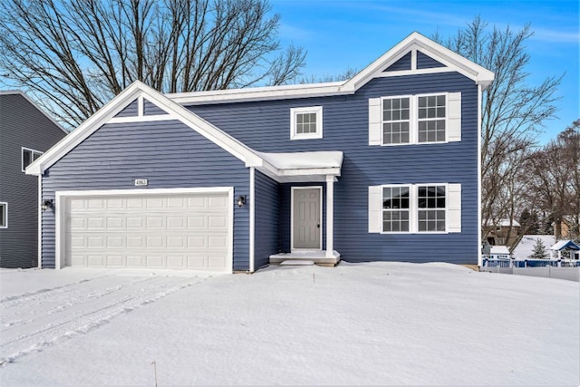 view of front of home with a garage