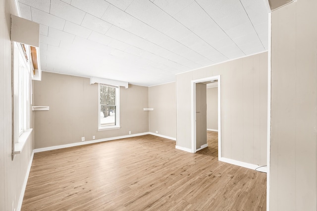 unfurnished room featuring light wood-type flooring