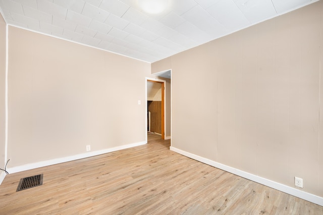 unfurnished room featuring light wood-type flooring