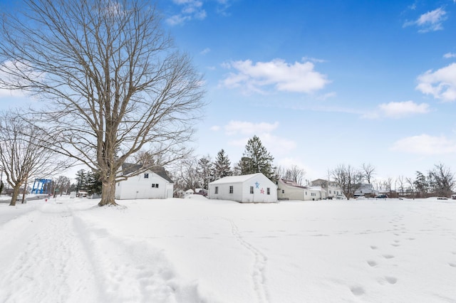 view of yard covered in snow