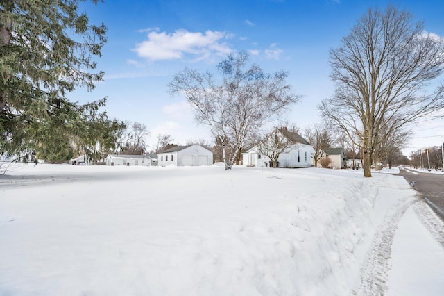 view of yard covered in snow